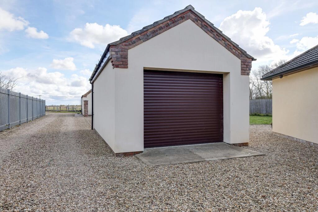 Block Built Garage With Alarm and Electric Roller Door - Equestrian Smallholding For Sale - South Lincolnshire and on the borders of Cambridgeshire and Norfolk